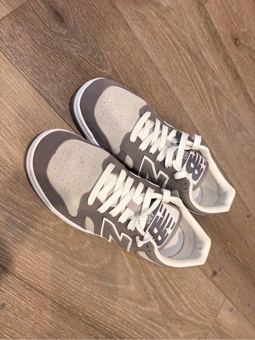 New Balance kids Gray and White Low-Top Sneakers